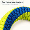 Close-up of the blue and yellow polypropylene yarn weave on the tug toy ring.